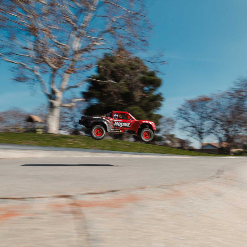 ARRMA MOJAVE GROM MEGA 380 Brushed 4X4 Small Scale Desert Truck RTR with Battery & Charger - Red/Black